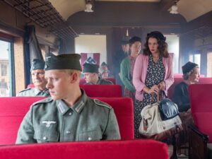 Evelyn Wood boards the train